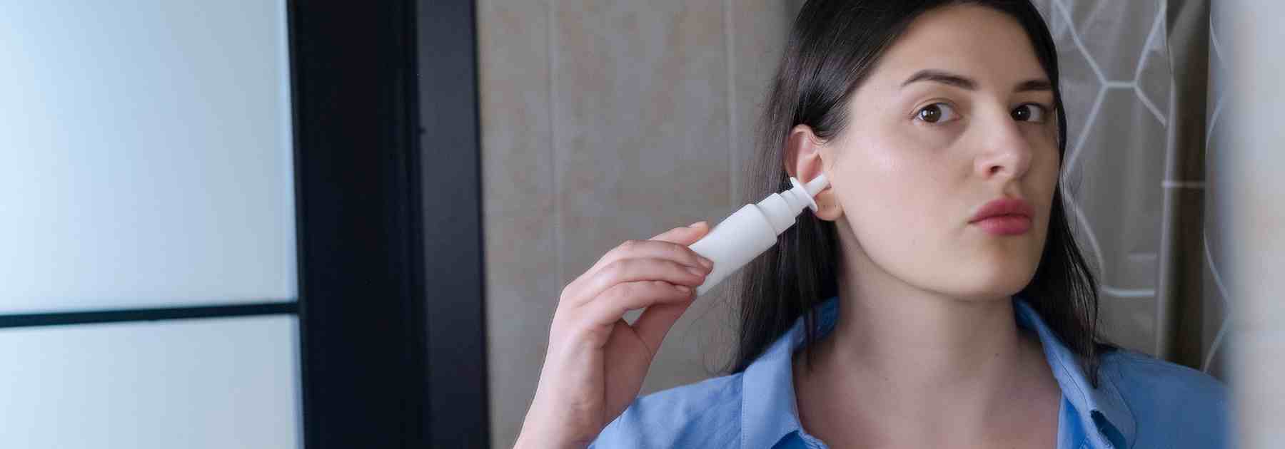 Clear a blocked ear